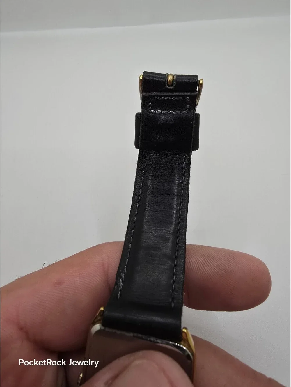 Seiko Quartz Rectangle Gold Tone Case Black Dial Black Leather Strap Watch